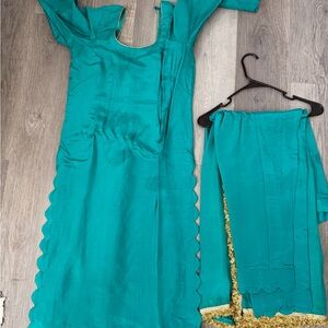 Elegant Teal pant suit with Gold Trim on supatta